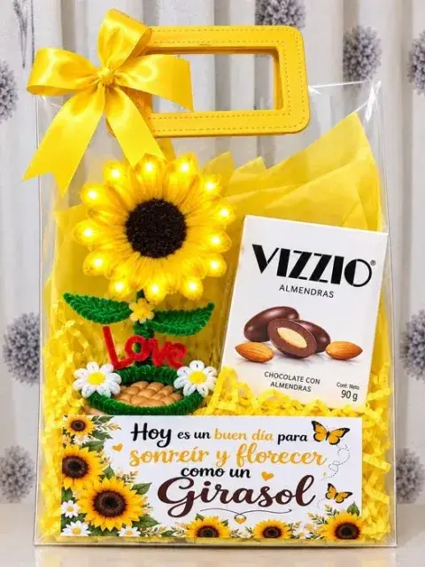 Detalle de girasol iluminado con chocolates
