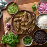 Seco de cabrito con frejoles y arroz