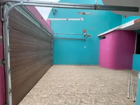 Cochera con porton elevado