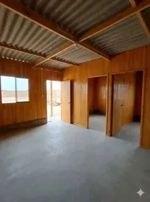 Casa prefabricada con acabado interior en madera