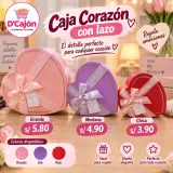 Caja de regalo en forma de corazón con lazo