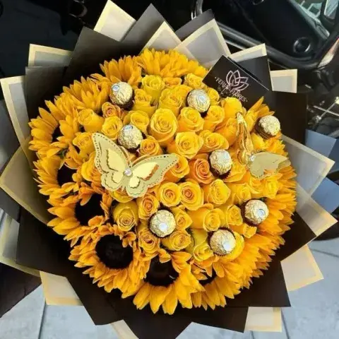Ramo de girasoles, rosas amarillas y chocolates