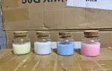 Frasco con vela aromática y tapa de corcho — recuerdo para bodas y baby shower