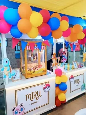 Barra de snacks y carrito de dulces para fiestas infantiles en Chimbote: pop corn, algodón de azúcar, manzanas acarameladas y decoración temática