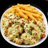 Alitas Acevichadas con Papa Frita